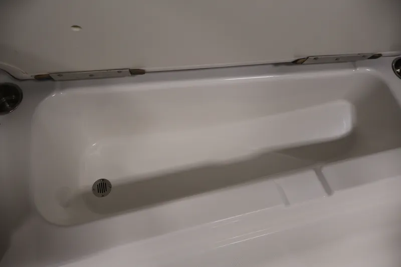 Slide: The Image of Interior view of a 2022 Tahoe T18 boat storage compartment. - 11