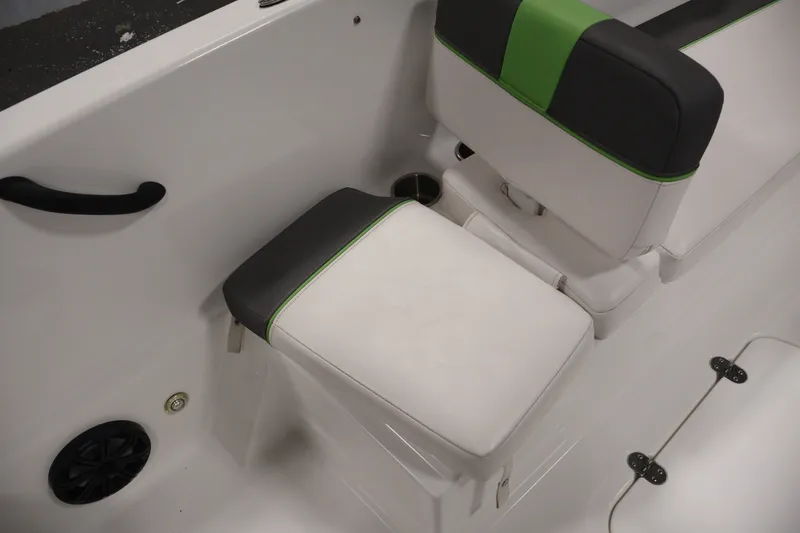 Slide: The Image of 2022 Tahoe T18 boat interior with white and green cushioned seating. - 27