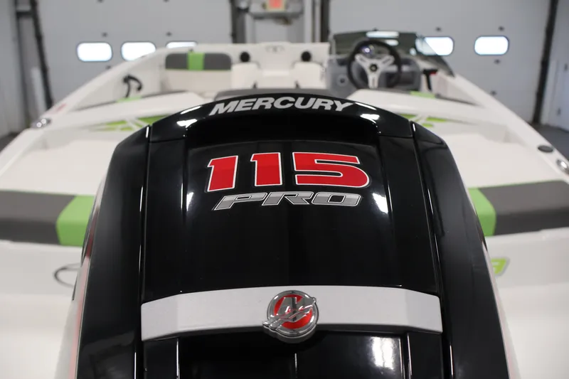 Slide: The Image of 2022 Tahoe T18 boat with Mercury 115 Pro outboard engine in a showroom. - 35