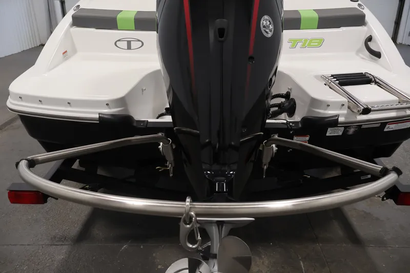Slide: The Image of 2022 Tahoe T18 boat rear view with motor and swim platform. - 36