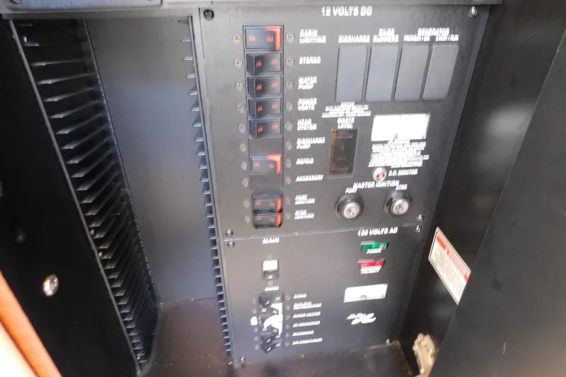 Slide: The Image of Electrical control panel of a 2001 Sea Ray 300 Sundancer boat. - 36