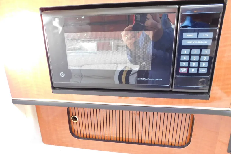 Slide: The Image of GE microwave in 2001 Sea Ray 300 Sundancer yacht kitchen. - 52