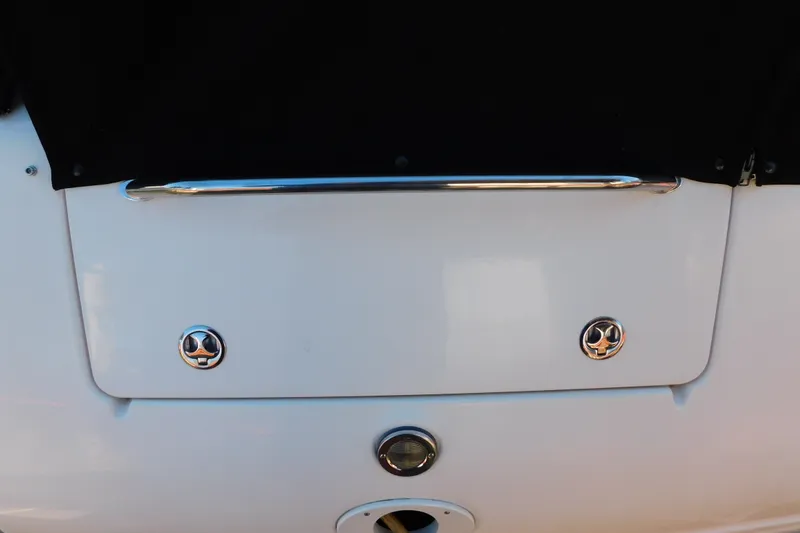 Slide: The Image of Rear view of 2001 Sea Ray 300 Sundancer boat with chrome details. - 11