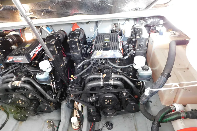 Slide: The Image of Engine compartment of a 2001 Sea Ray 300 Sundancer with twin MerCruiser 5.7L engines. - 71