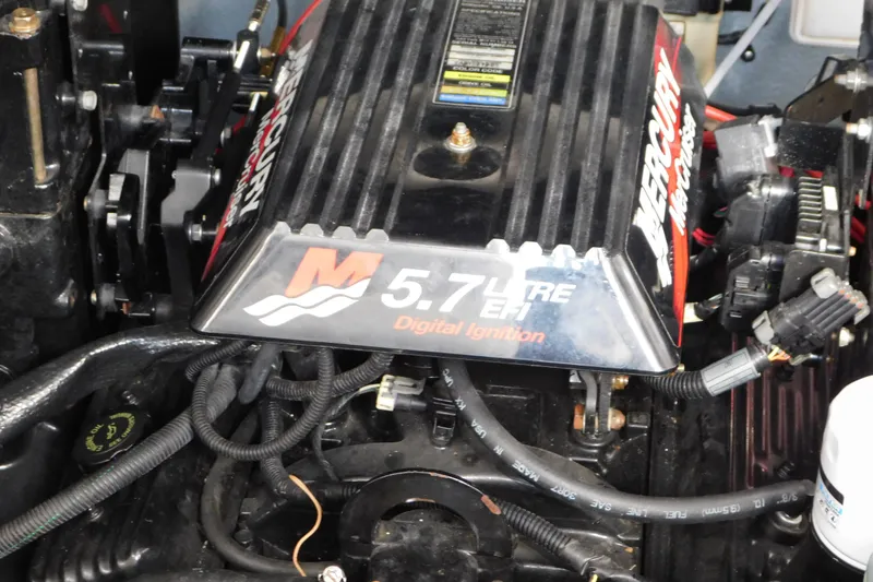 Slide: The Image of Engine of a 2001 Sea Ray 300 Sundancer with 5.7L EFI digital ignition. - 76