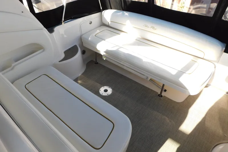 Slide: The Image of Interior seating area of a 2001 Sea Ray 300 Sundancer boat. - 8