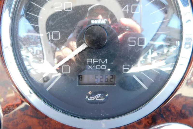 Slide: The Image of Close-up of a 2001 Sea Ray 300 Sundancer RPM gauge showing 526.2 hours. - 66