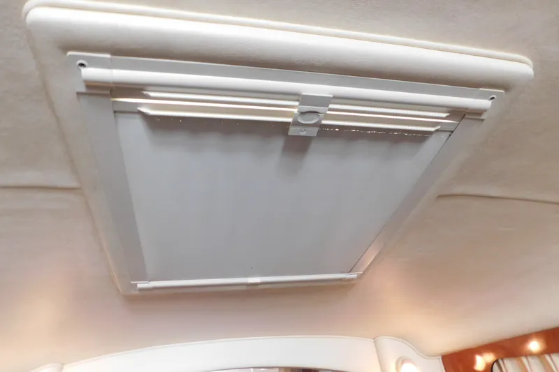 Slide: The Image of Ceiling hatch inside 2001 Sea Ray 300 Sundancer boat cabin. - 64