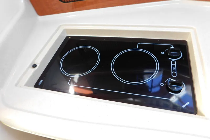 Slide: The Image of Built-in stovetop on 2001 Sea Ray 300 Sundancer yacht kitchen. - 51