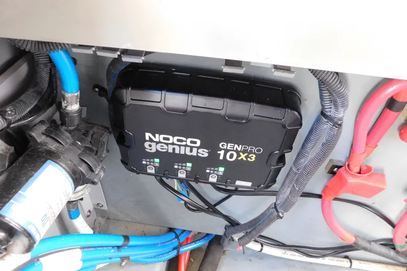 Slide: The Image of NOCO Genius GENPRO 10X3 charger in 2001 Sea Ray 300 Sundancer boat engine compartment. - 73