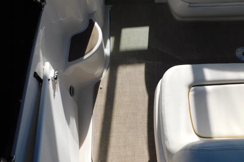 Slide: The Image of Interior view of 2001 Sea Ray 300 Sundancer boat with seating and carpet. - 15