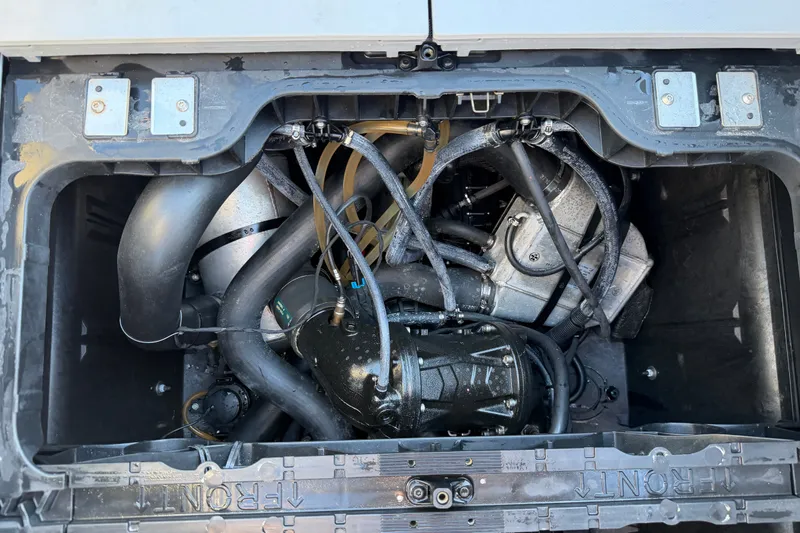 Slide: The Image of Engine compartment of 2023 Sea-Doo Switch Sport 21, showcasing intricate mechanical components. - 14