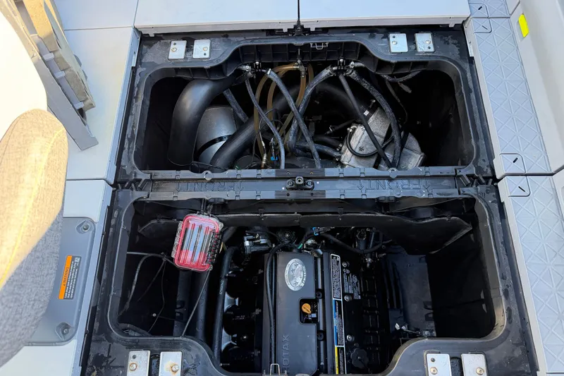 Slide: The Image of Engine compartment of 2023 Sea-Doo Switch Sport 21, showcasing internal components and layout. - 13