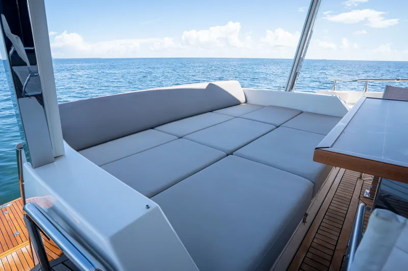 Slide: The Image of Luxurious seating area on 2022 Astondoa 66 Fly yacht with ocean view. - 23