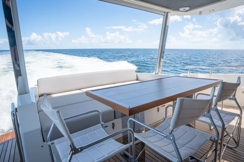 Slide: The Image of Astondoa 66 Fly 2022 yacht deck with seating and ocean view. - 22