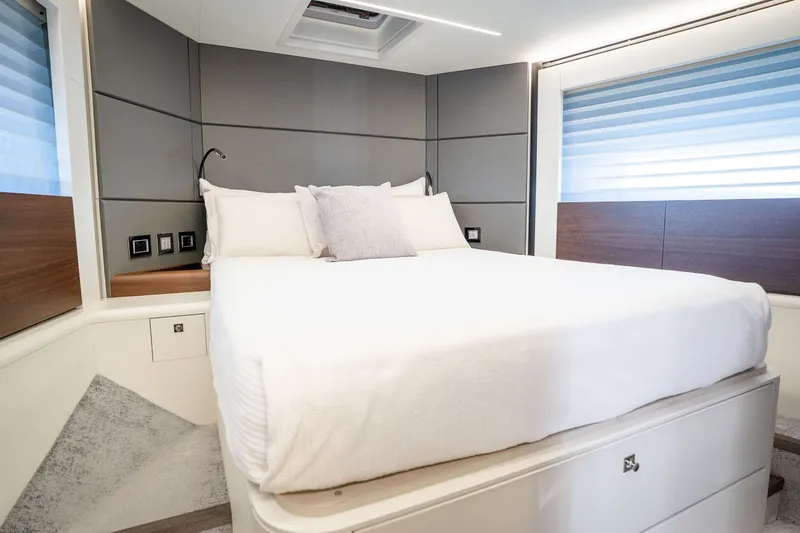Slide: The Image of Luxurious bedroom interior of 2022 Astondoa 66 Fly yacht, featuring modern design and elegant furnishings. - 42