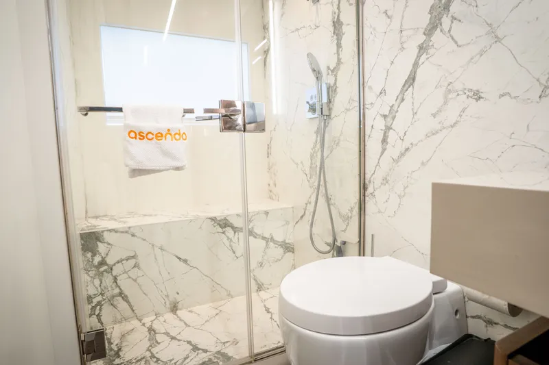 Slide: The Image of Luxurious marble bathroom in 2022 Astondoa 66 Fly yacht, featuring modern shower and toilet. - 39