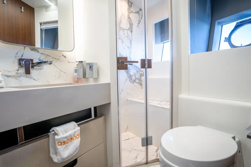 Slide: The Image of Luxurious bathroom in 2022 Astondoa 66 Fly yacht with marble accents and modern fixtures. - 43