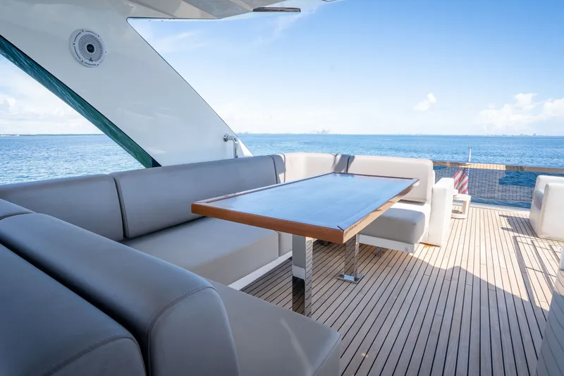 Slide: The Image of Luxurious outdoor seating on 2022 Astondoa 66 Fly yacht with ocean view. - 10