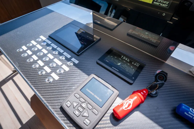 Slide: The Image of Control panel of 2022 Astondoa 66 Fly yacht with navigation displays and equipment. - 30