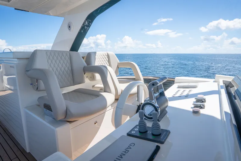 Slide: The Image of Luxurious helm of 2022 Astondoa 66 Fly yacht with ocean view. - 13
