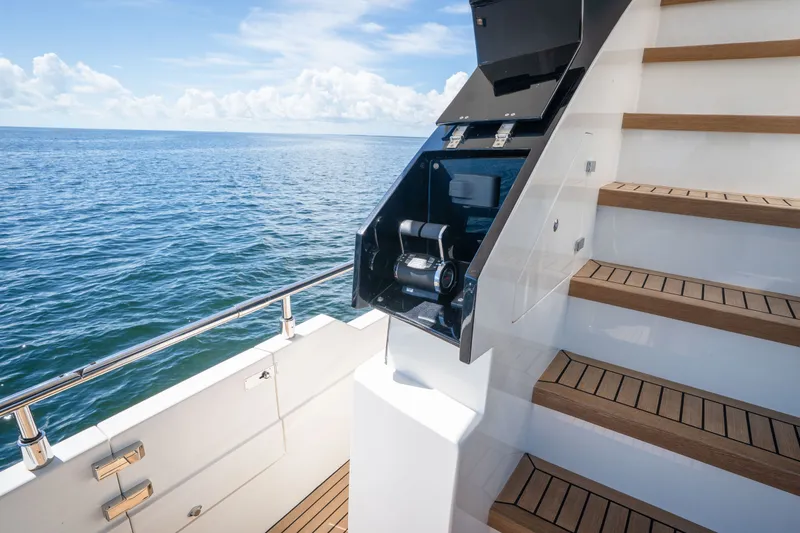 Slide: The Image of Astondoa 66 Fly 2022 yacht staircase with ocean view and sleek design. - 17