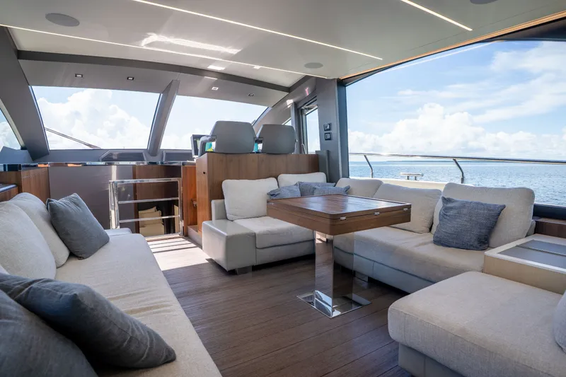 Slide: The Image of Luxurious interior of 2022 Astondoa 66 Fly yacht with ocean view and modern seating. - 26