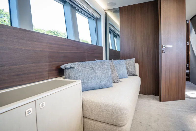 Slide: The Image of Luxurious interior of 2022 Astondoa 66 Fly yacht with modern seating and wooden accents. - 37