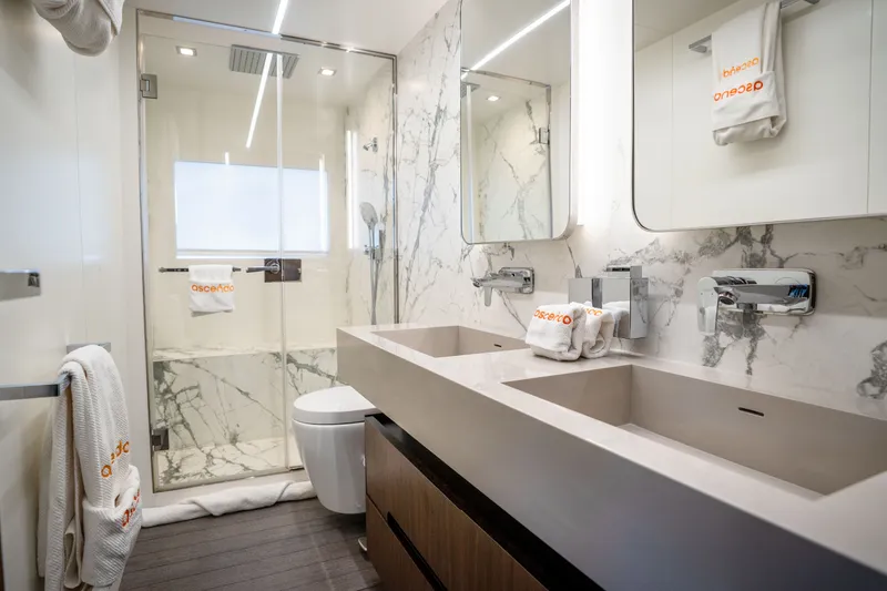 Slide: The Image of Luxurious bathroom in 2022 Astondoa 66 Fly yacht with marble accents and modern fixtures. - 38