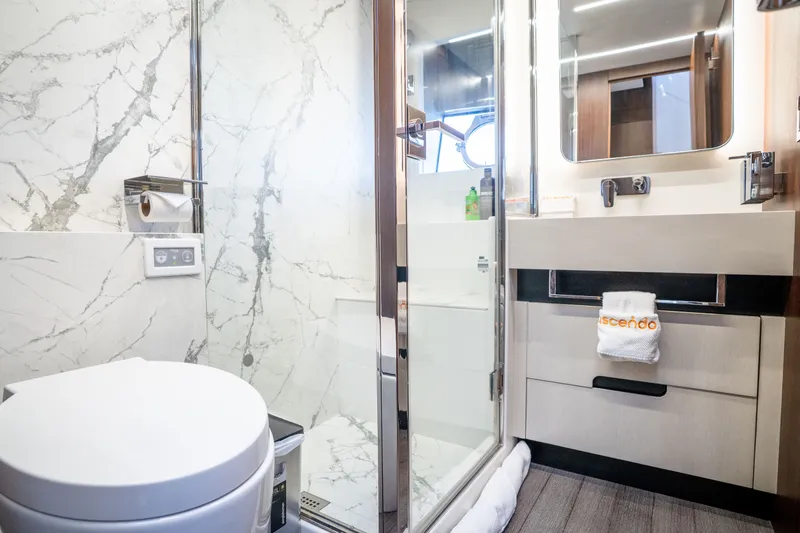 Slide: The Image of Luxurious bathroom in 2022 Astondoa 66 Fly yacht with marble accents and modern fixtures. - 47