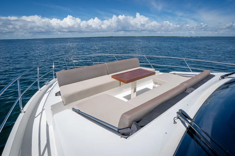 Slide: The Image of Luxurious 2022 Astondoa 66 Fly yacht deck with seating and ocean view. - 19