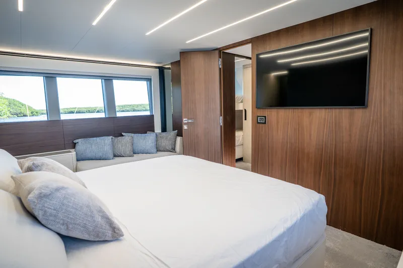 Slide: The Image of Luxurious bedroom interior of 2022 Astondoa 66 Fly yacht with modern design and large windows. - 36