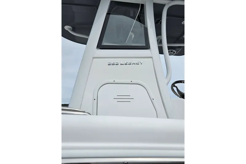 Slide: The Image of 2025 NauticStar 252 Legacy boat console with sleek design and modern features. - 1