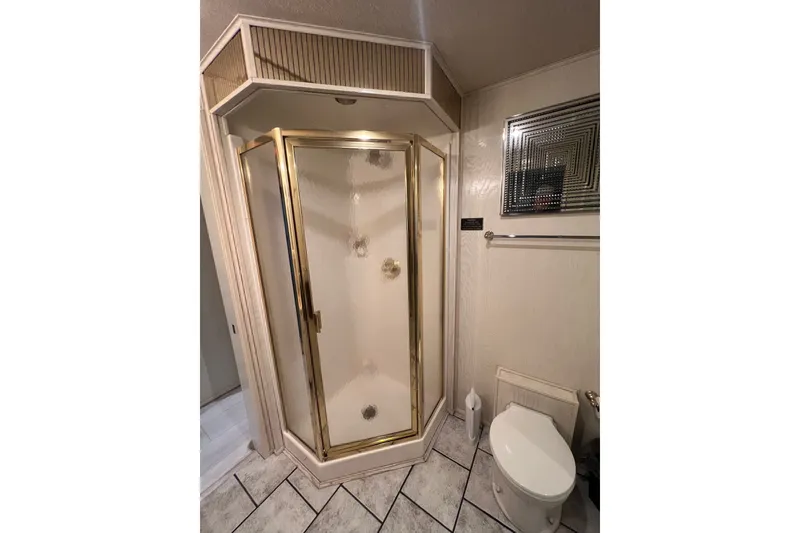 Slide: The Image of Luxurious bathroom with gold-framed shower in 1999 Fantasy Custom model. - 41