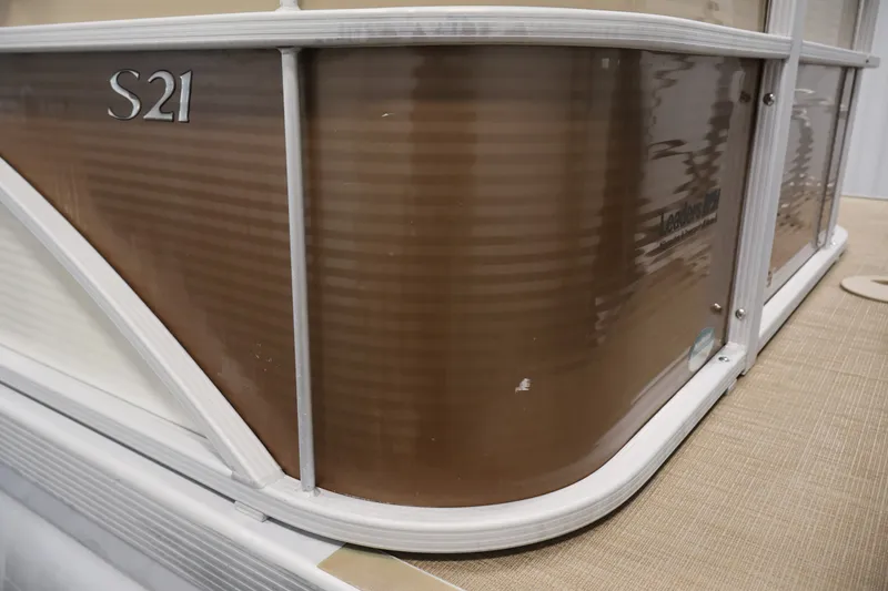 Slide: The Image of 2017 Bennington 21 SL pontoon boat, brown exterior detail with S21 marking. - 41