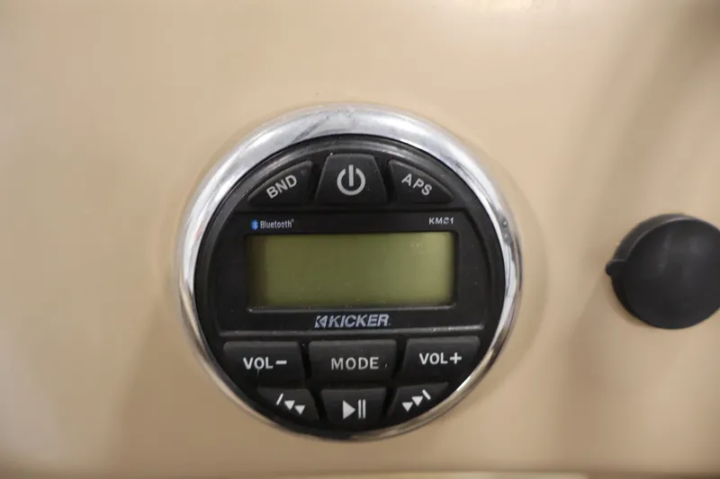 Slide: The Image of Kicker audio control panel on 2017 Bennington 21 SL boat dashboard. - 22