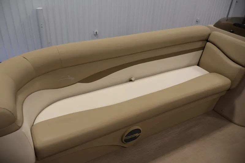 Slide: The Image of 2017 Bennington 21 SL boat interior with beige and cream seating. - 13