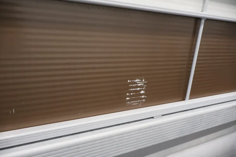 Slide: The Image of 2017 Bennington 21 SL boat panel with visible scratch marks. - 36