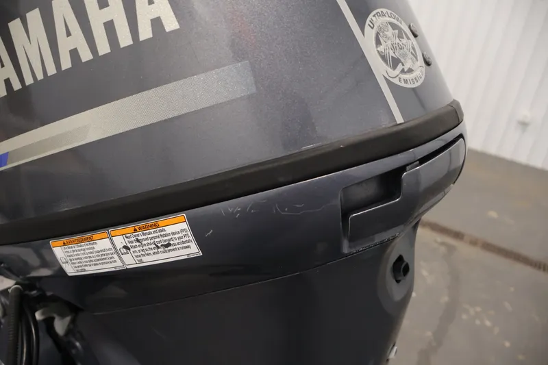 Slide: The Image of Close-up of a Yamaha outboard motor on a 2017 Bennington 21 SL boat. - 39