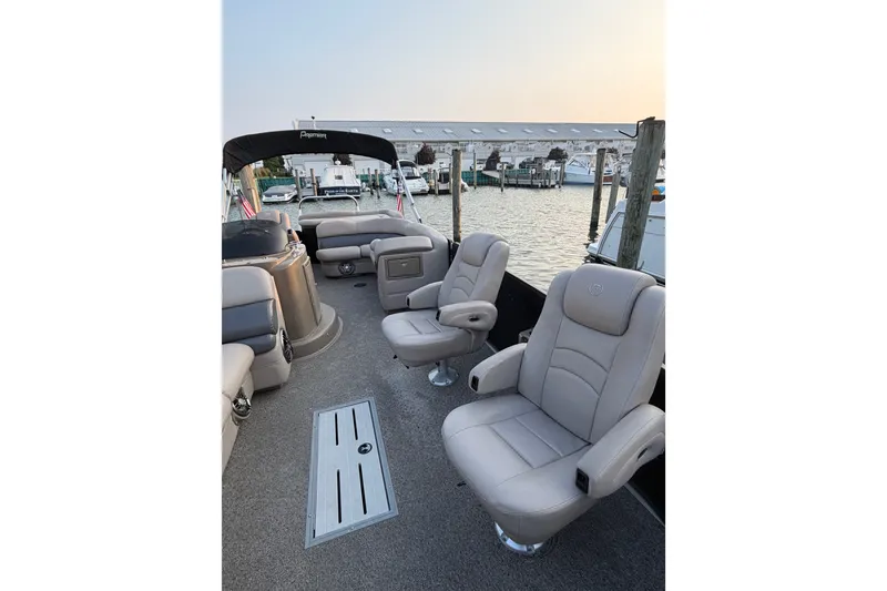 Slide: The Image of Luxurious 2012 Premier 250 Grand Majestic LTD pontoon boat interior with plush seating. - 6