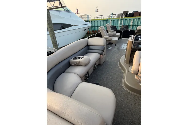 Slide: The Image of Premier 250 Grand Majestic LTD 2012 pontoon boat with luxurious seating and modern design. - 21