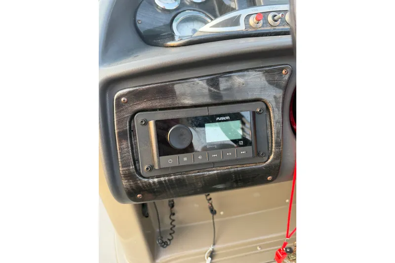 Slide: The Image of Dashboard of a 2012 Premier 250 Grand Majestic LTD with Fusion stereo system. - 17