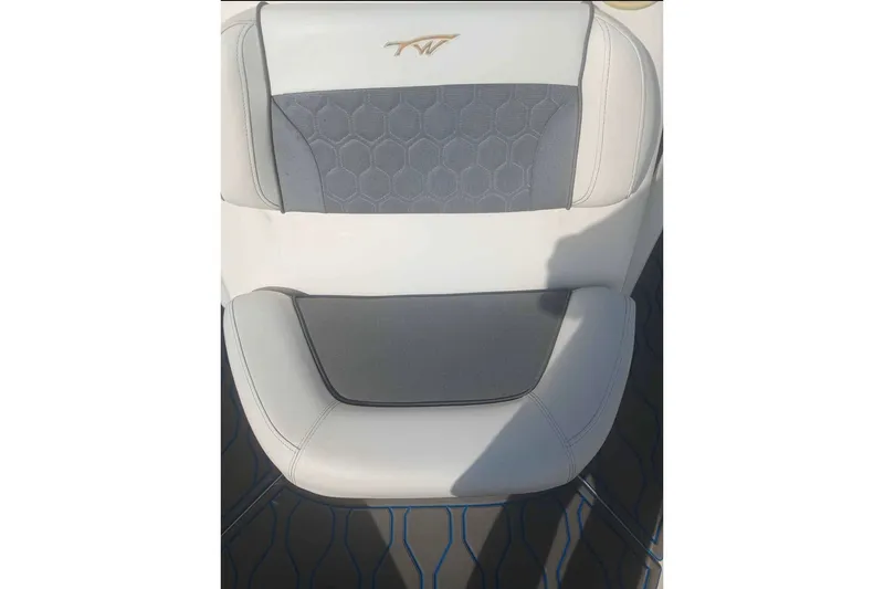 Slide: The Image of 2019 Tidewater 210 CC Adventure boat seat with gray and white upholstery. - 5