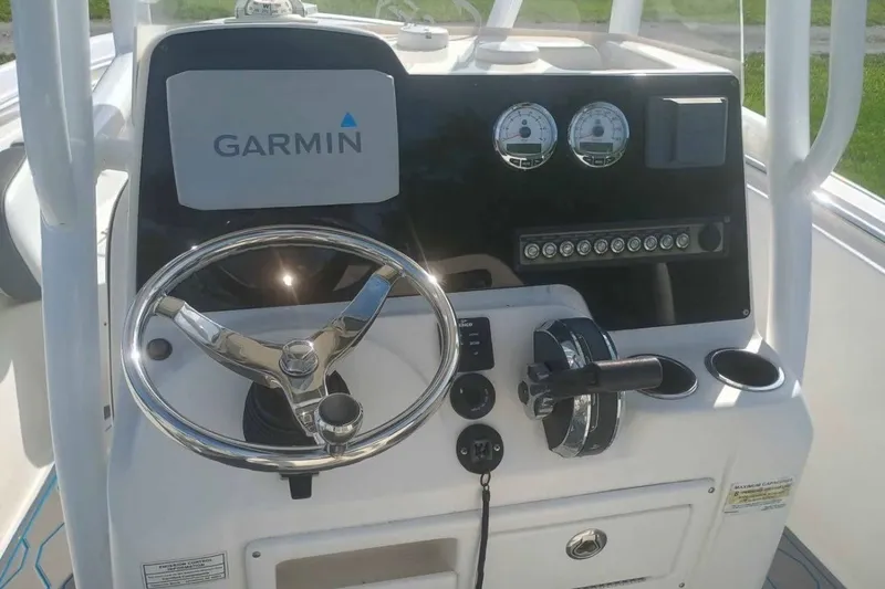 Slide: The Image of 2019 Tidewater 210 CC Adventure boat console with Garmin navigation system. - 7