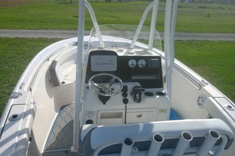 Slide: The Image of 2019 Tidewater 210 CC Adventure boat cockpit with Garmin navigation system. - 4