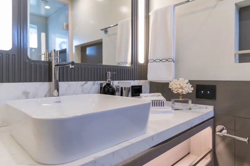 Slide: The Image of Modern bathroom interior on Sirena 78 yacht, featuring sleek sink and elegant decor, 2027 model. - 36