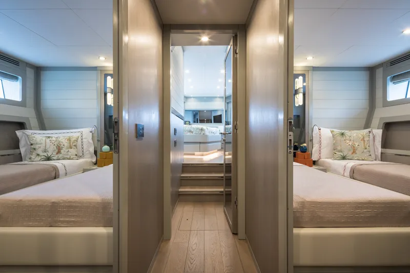 Slide: The Image of Luxurious Sirena 78 yacht interior, featuring elegant twin beds and modern design, 2027 model. - 39