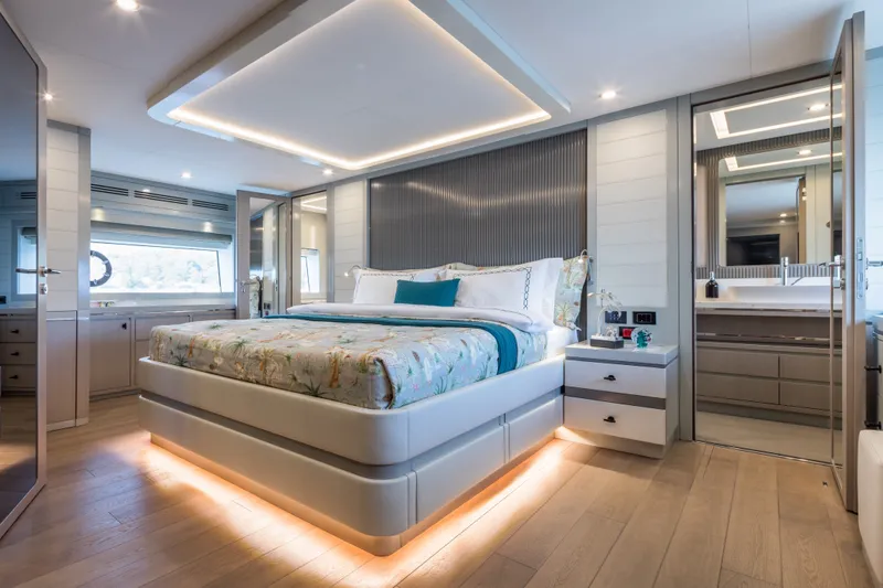 Slide: The Image of Luxurious Sirena 78 yacht bedroom interior, featuring modern design and ambient lighting, 2027 model. - 33