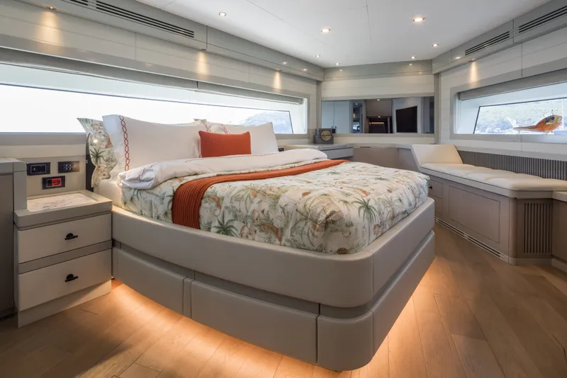 Slide: The Image of Luxurious Sirena 78 yacht bedroom interior, 2027 model, featuring elegant design and panoramic windows. - 31