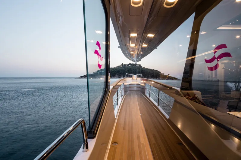 Slide: The Image of Luxurious Sirena 78 yacht deck with ocean view, 2027 model, featuring sleek design and modern amenities. - 17